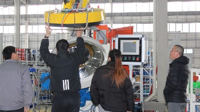 天津磁性材料客戶參觀榴莲网站全自動滾噴機器